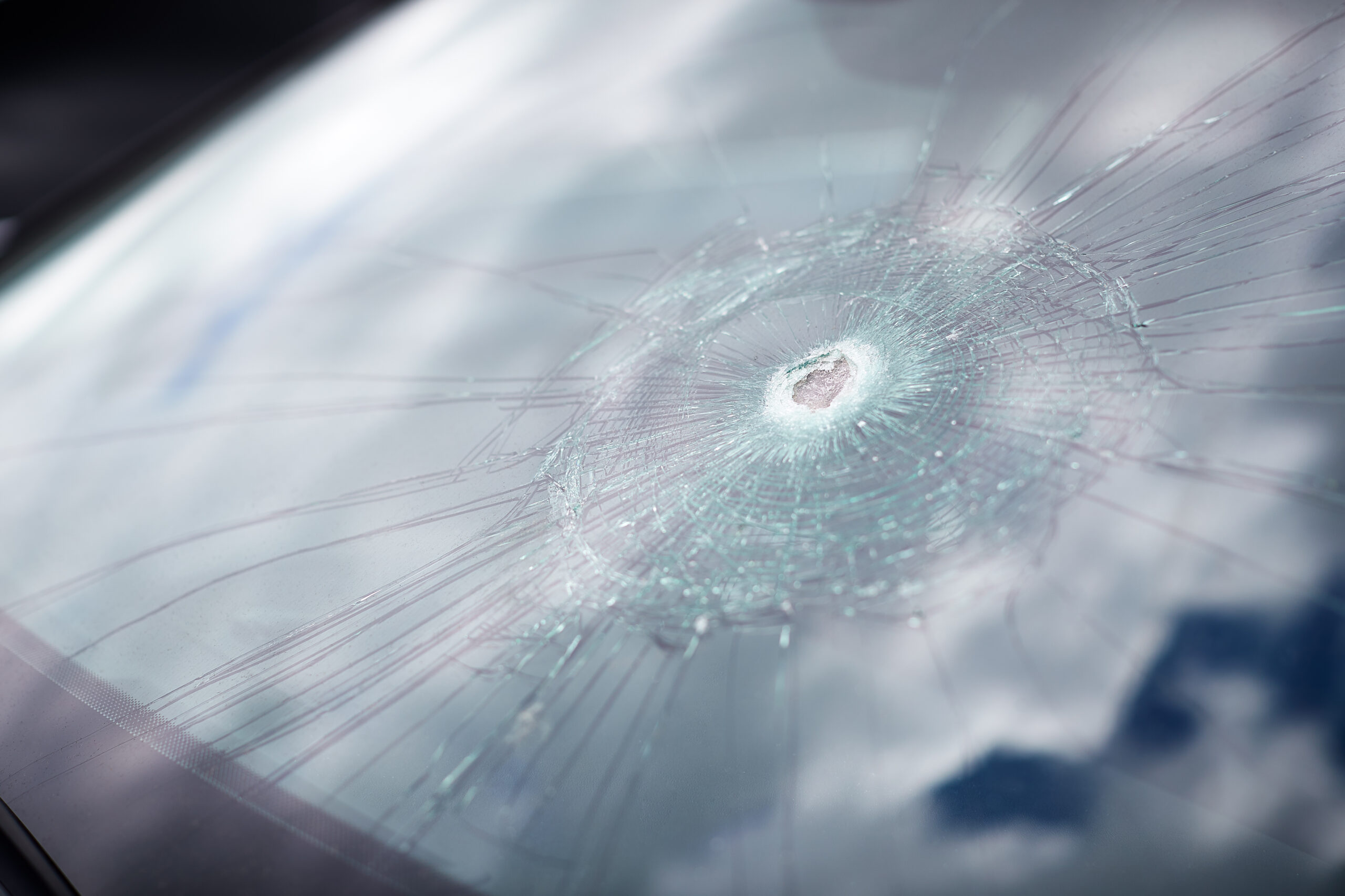 Damaged window due to hail.