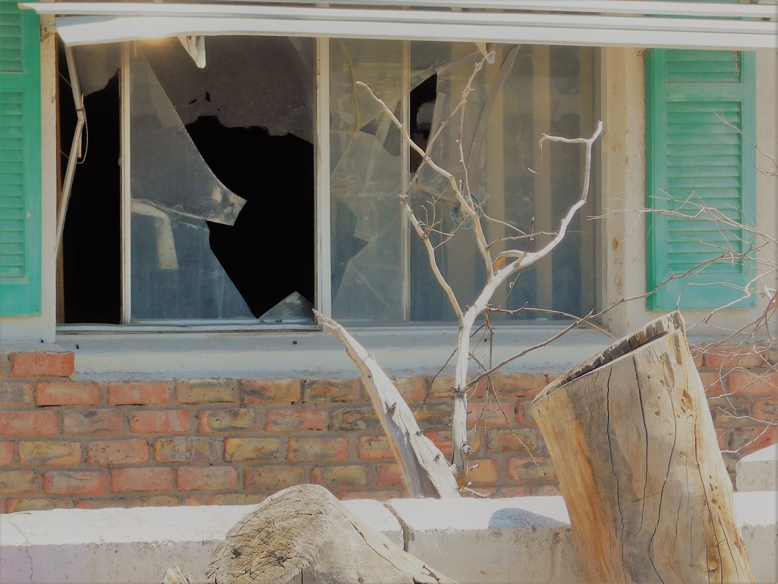 Broken window glasses due to hurricane.